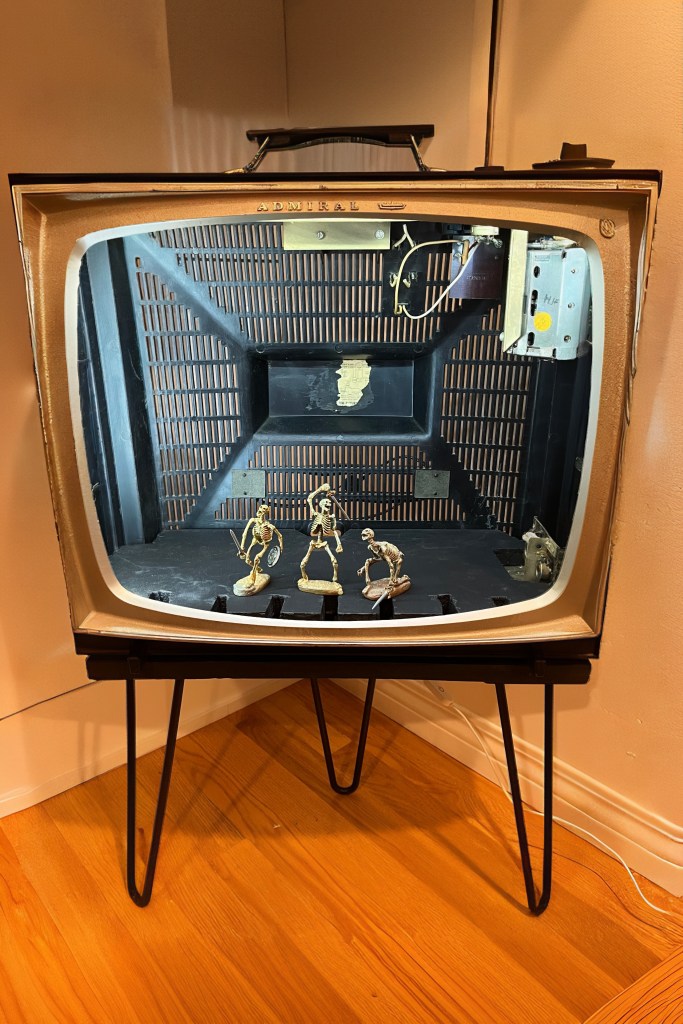 Admiral TV with Ray Harryhausen skeleton figurines inside