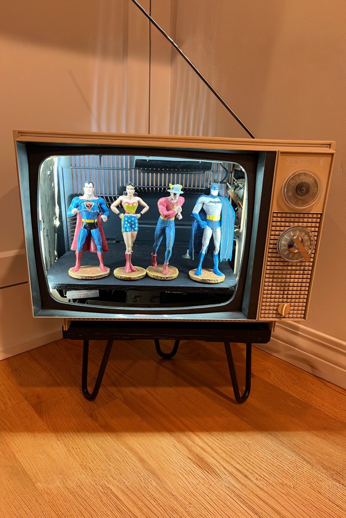 Zenith TV with Golden Age DC Hero figurines inside